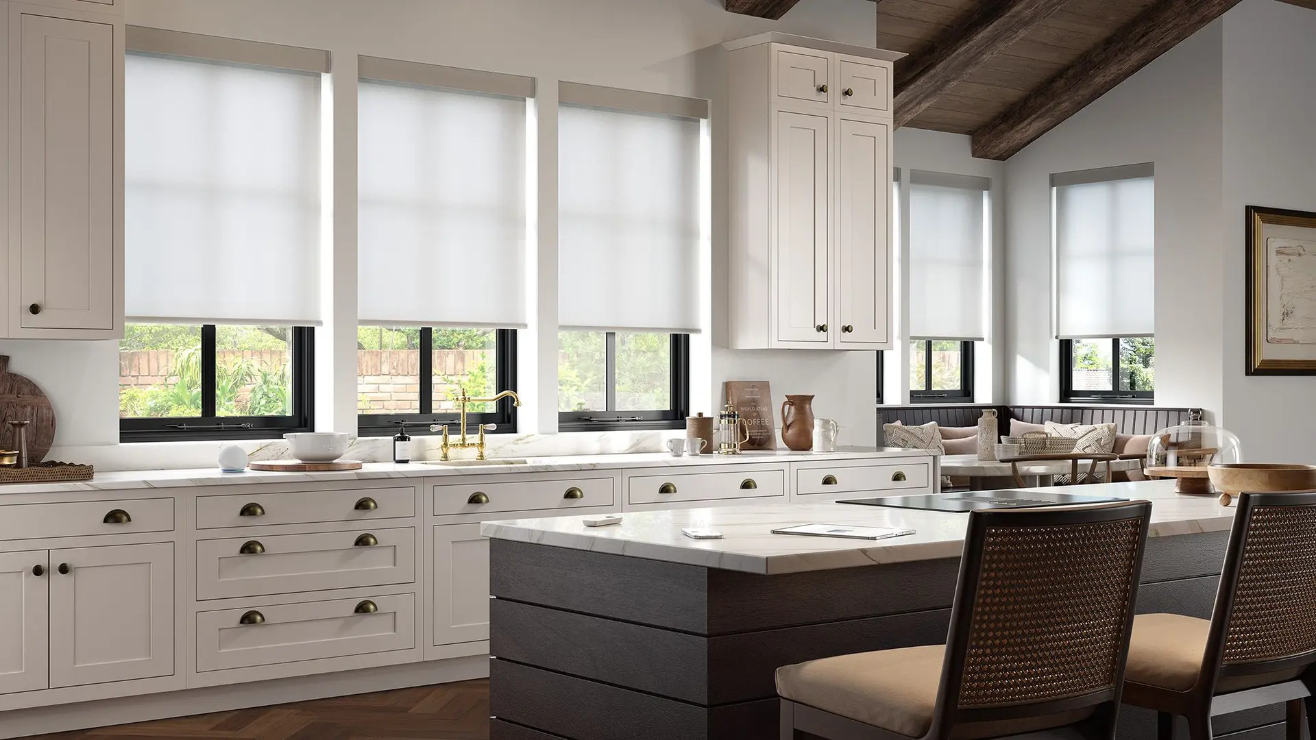 Alta Window Fashions roller shades in a bright white kitchen