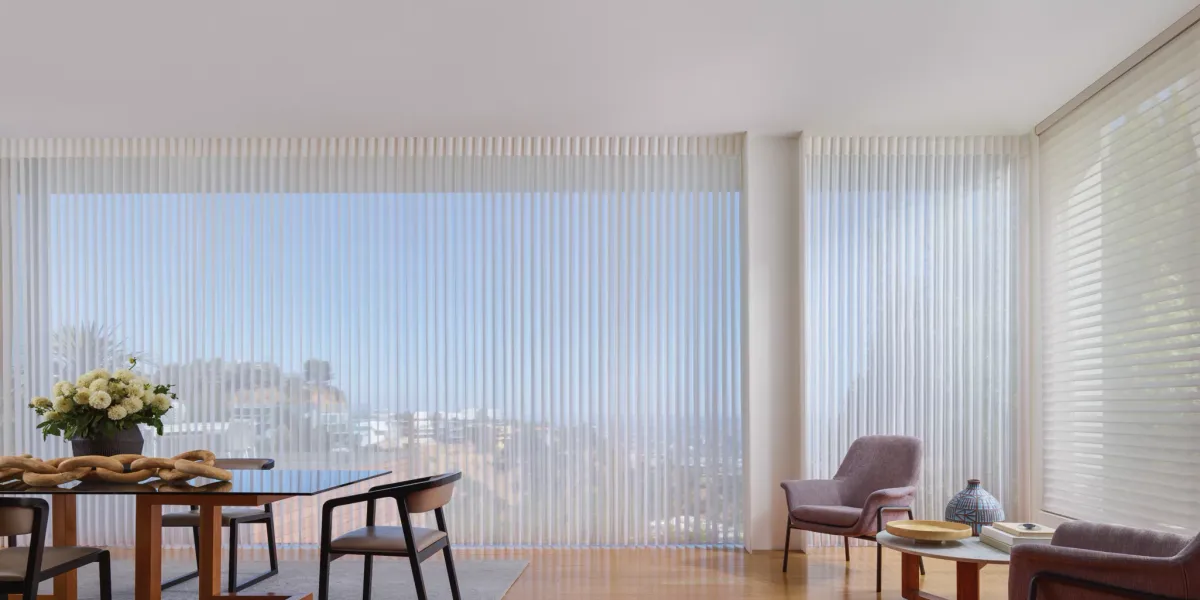 Hunter Douglas Luminette vertical sheer panels in a dining room