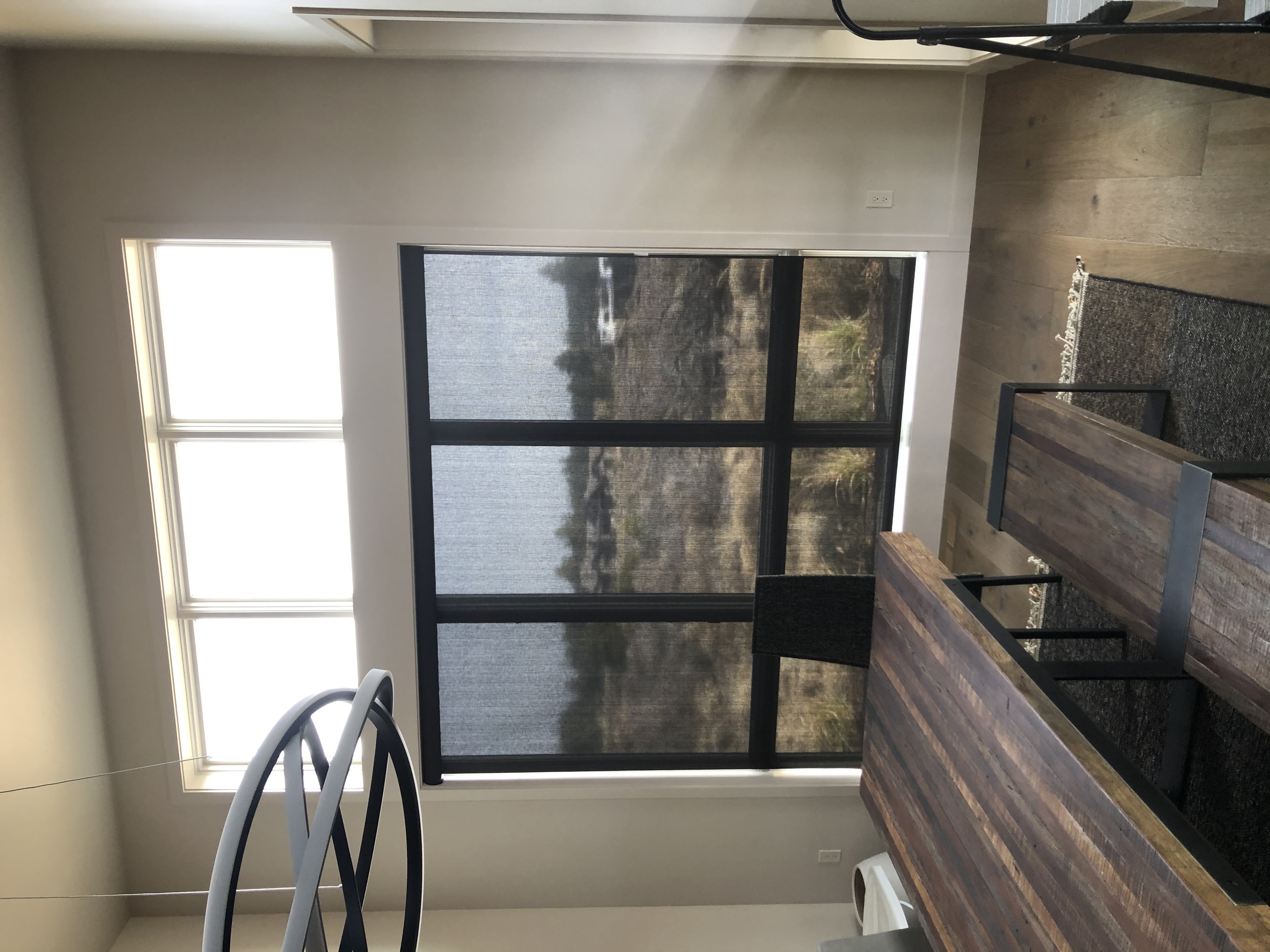 Energy-efficient cellular shades installed in a craftsman-style home in Coeur d'Alene reducing drafts and winter heat loss